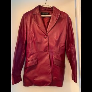 Red (dark red) leather jacket.  Two pockets , two button closure. Perfect Cond.